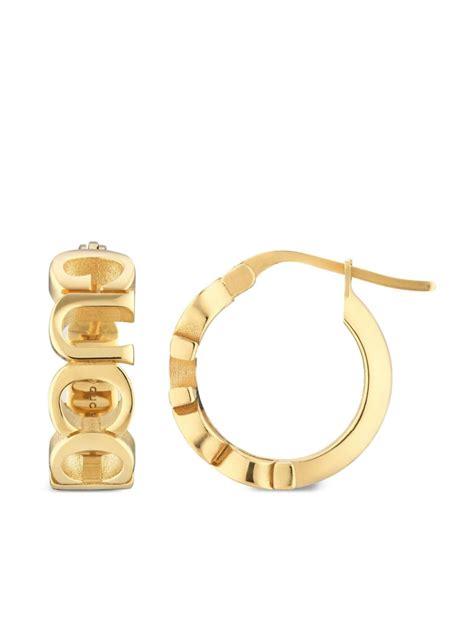 giacchetto gucci dorato|Logo hoop earrings in gold .